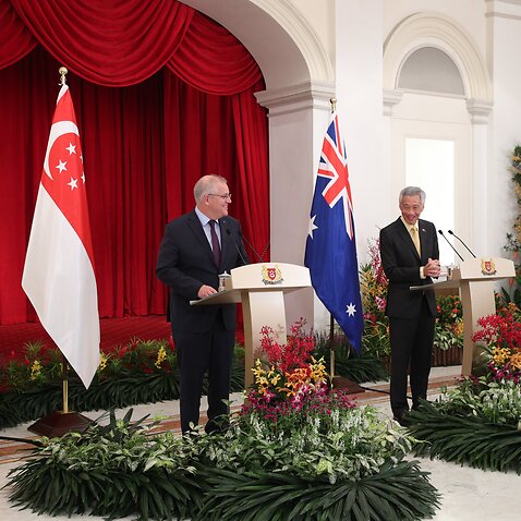 Prime Minister Scott Morrison has completed a trip to Singapore and is now on his way to Cornwall to meet with world leaders at the G7 summit.