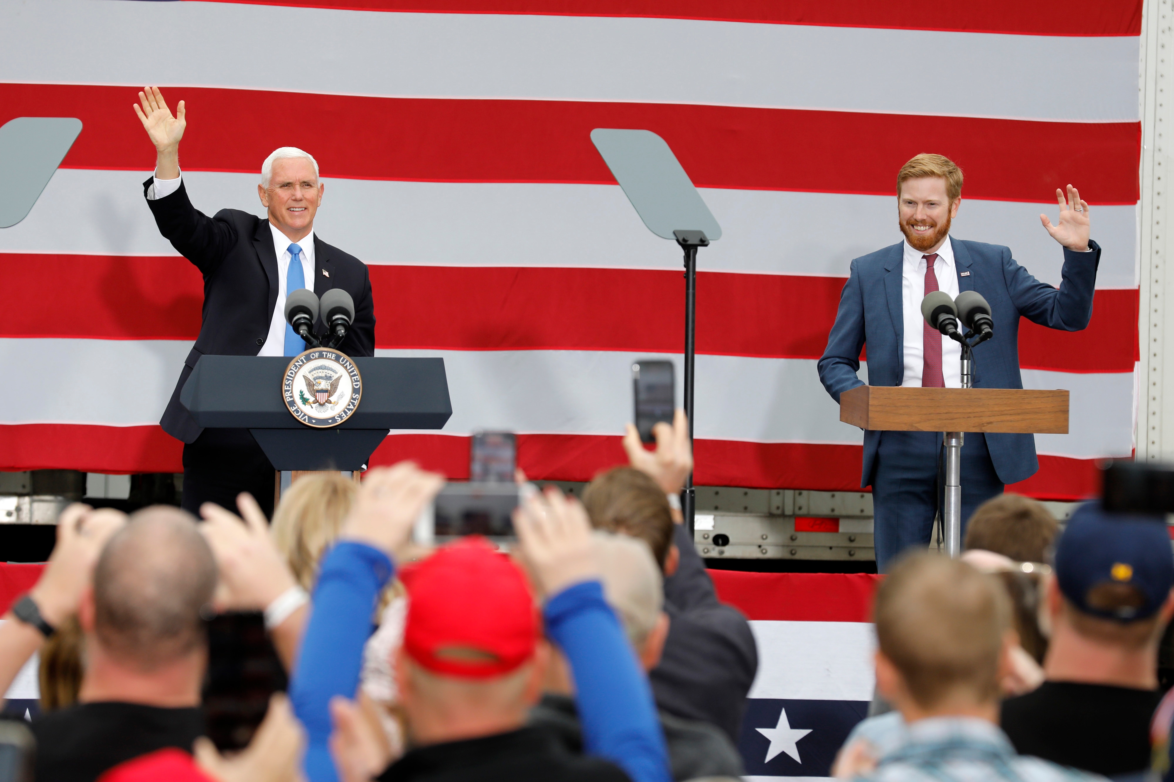 Peter Meijer (R) stands with then-US Vice President Mike Pence at a campaign event in Grand Rapids, Michigan, in October 2020. 