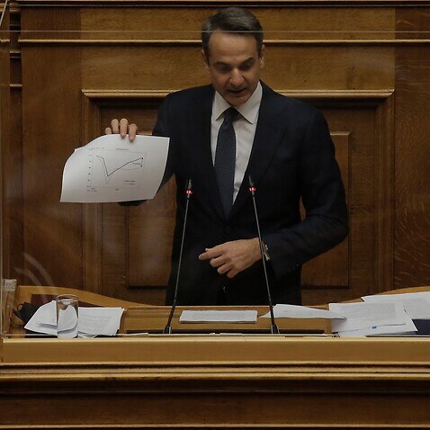 Greek Prime Minister Kyriakos Mitsotakis delivers a speech in Parliament 