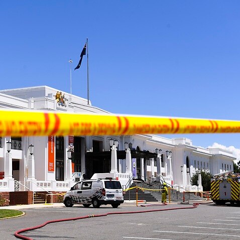 A view of fire-damaged entrance doors to Old Parliament House in Canberra.