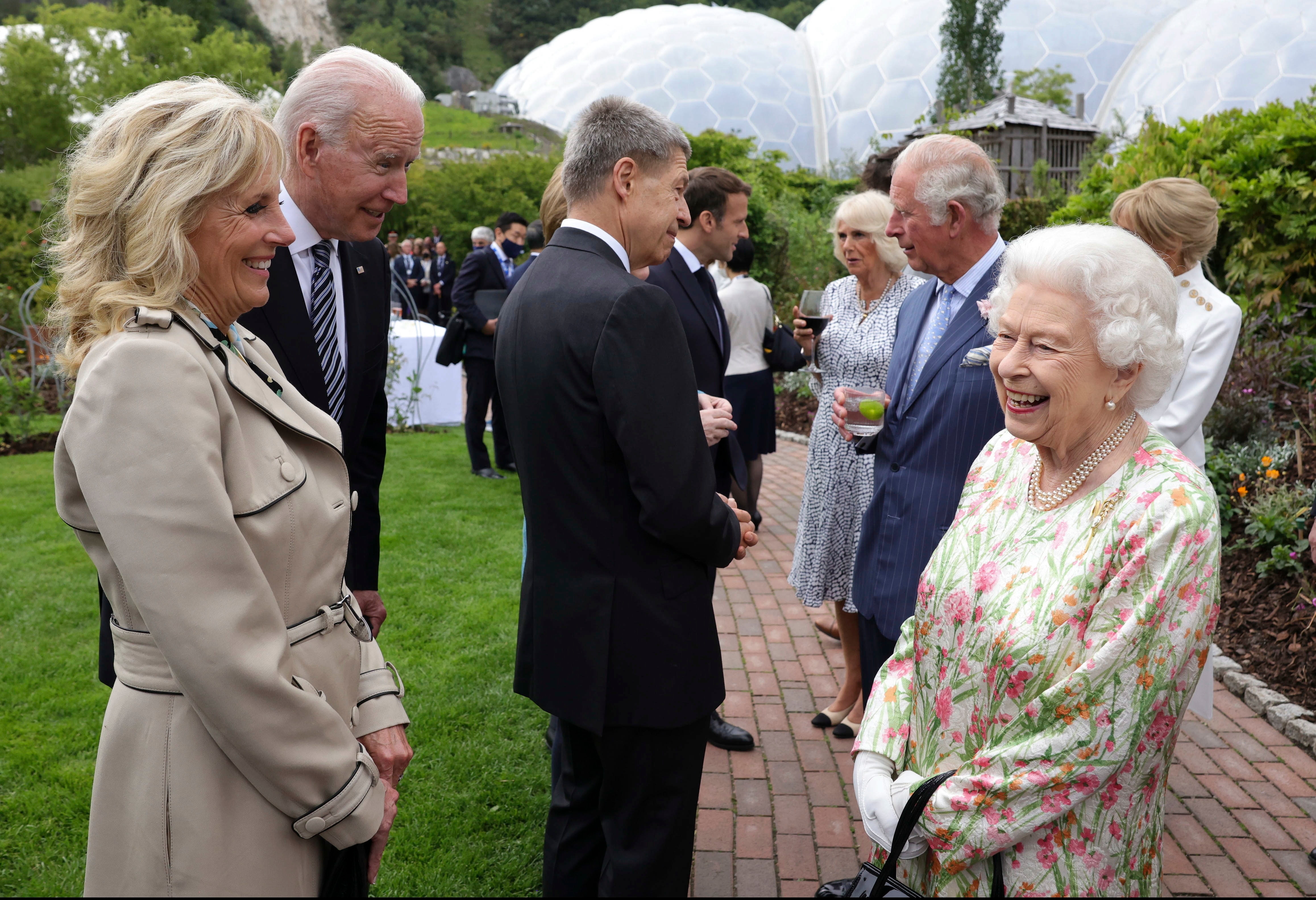 Queen Elizabeth shares a moment with US President Joe Biden and his wife Jill during a reception at the G7 summit in Cornwall, Britain, on 11 June.