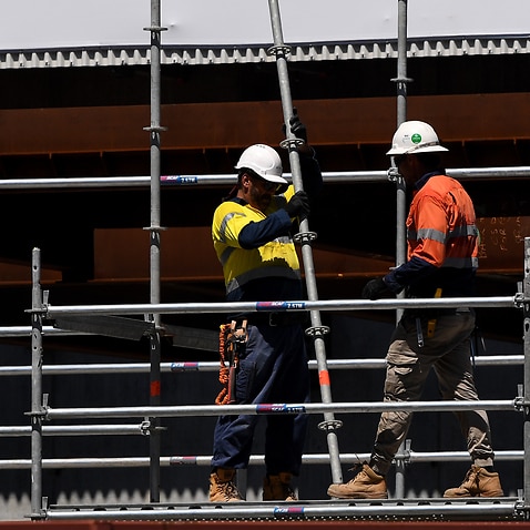 Workers seen at a construction site in Sydney in 2019