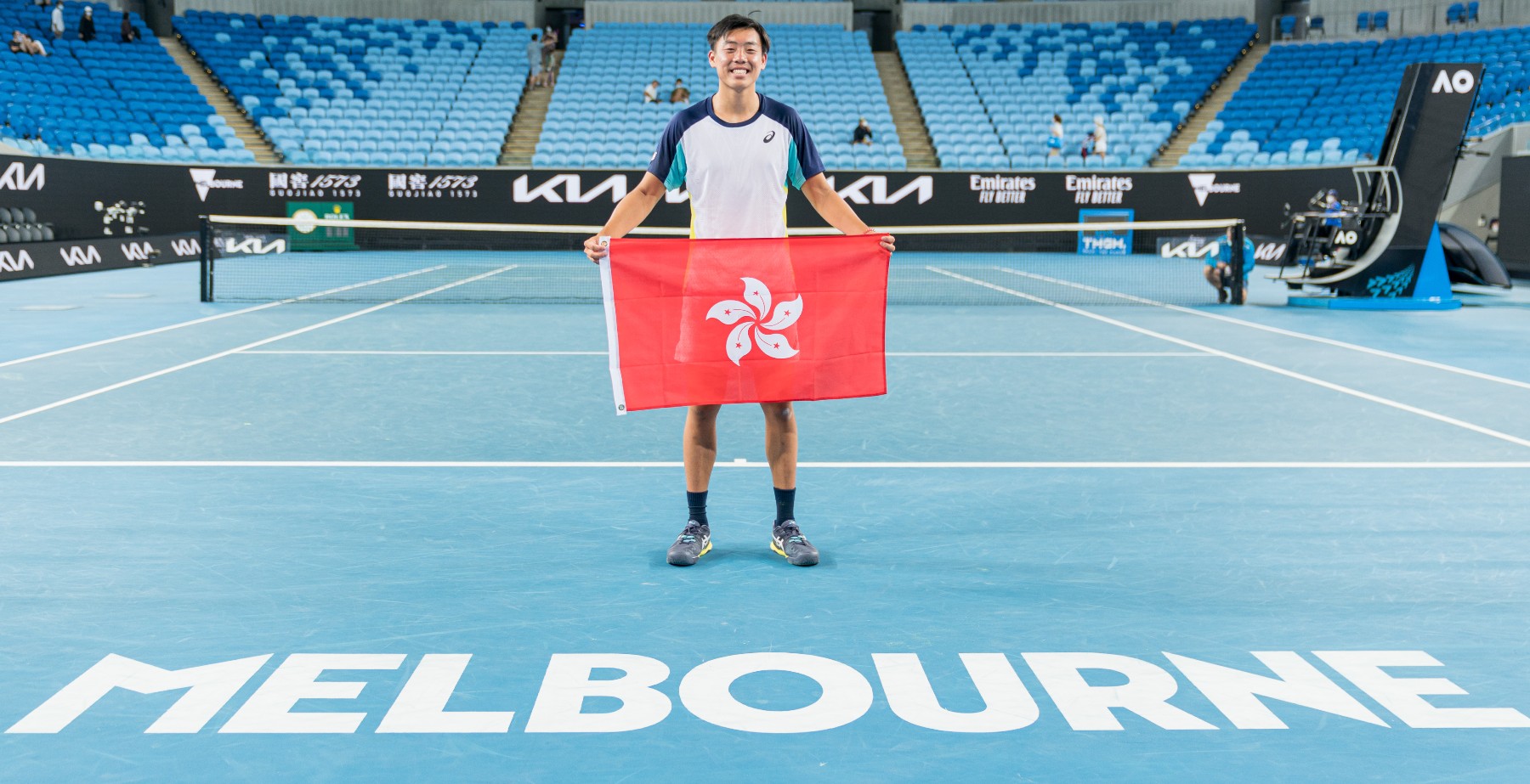 MELBOURNE, AUSTRALIA - JANUARY 28: Chak Lam Coleman Wong of Hong Kong poses during the trophy presentation of the Junior Boy’s Doubles Final with partner Bruno Kuzuhara of United States after defeating Alex Michelsen of United States and Adolfo Daniel Val