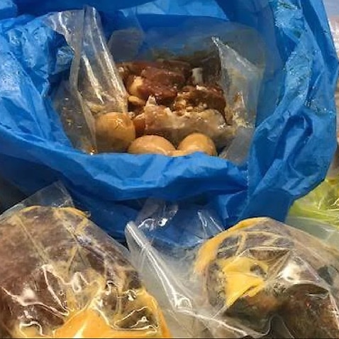 Part of the haul in luggage of Vietnamese women deported over bringing in uncooked pork.