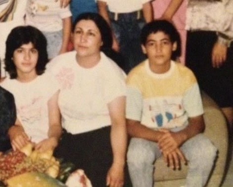 Ms Motearefi (left of centre) with her cousin in Iran (right of centre).
