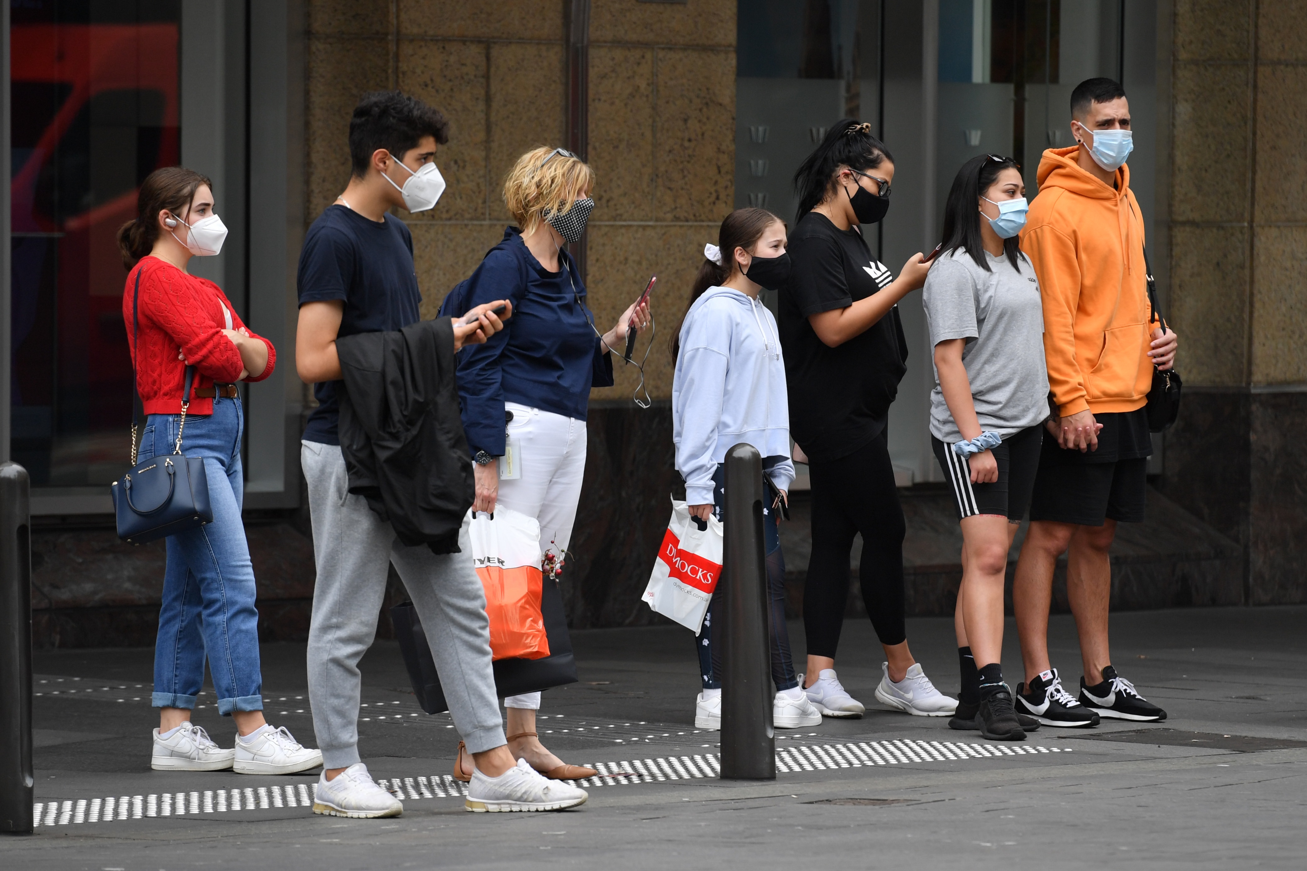 People wearing facemasks in the Sydney CBD in December 2020.  