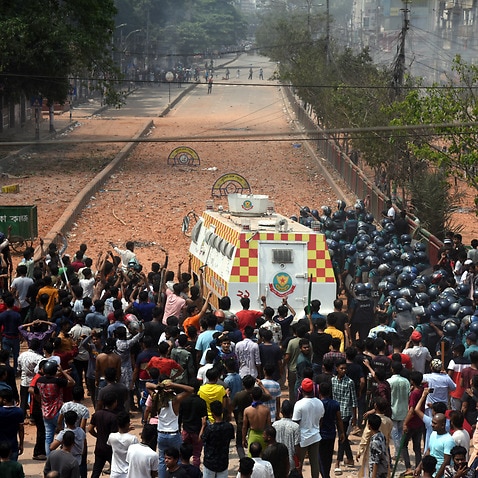 Police gather use tear gas shells to disperse students from Dhaka college after they clashed with the New Market traders in Dhaka on April 19, 2022. Photo by Habibur Rahman/ABACAPRESS.COM.