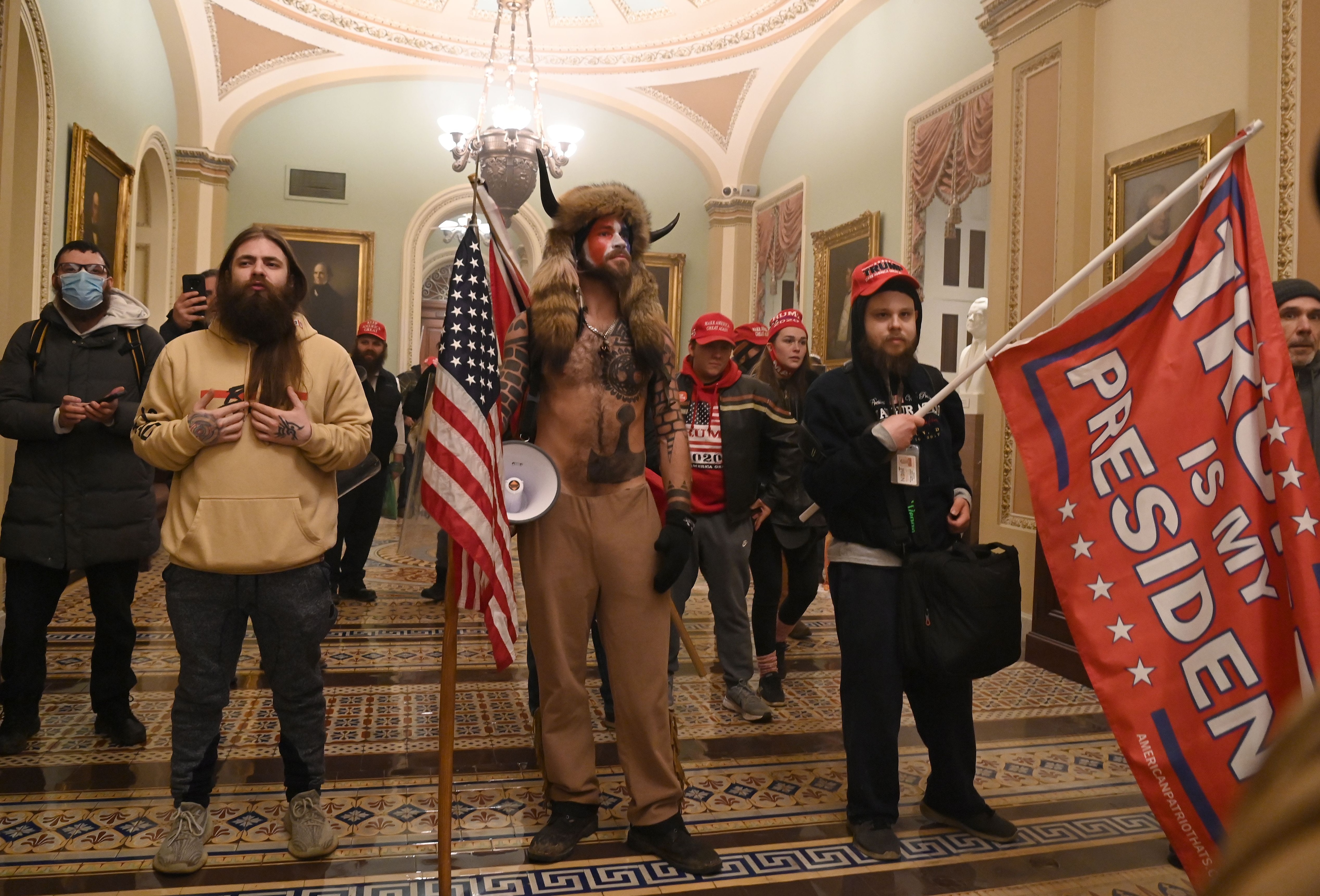 Jake Angeli and fellow Trump supporters stormed the US Capitol.