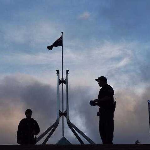 Police seen outside Parliament House Canberra.