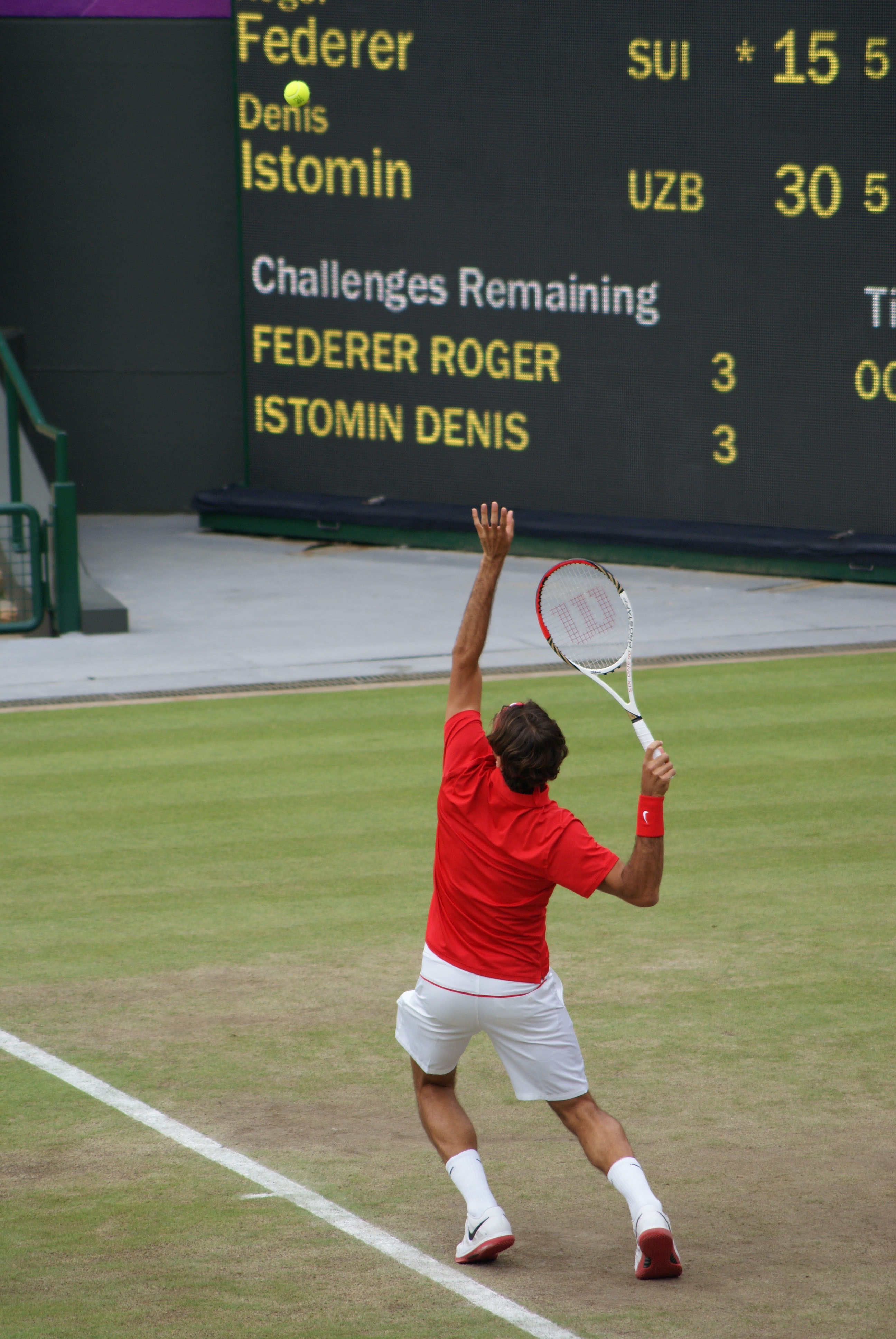 Roger Federer serving during one of his matches at the 2012 London Olympics