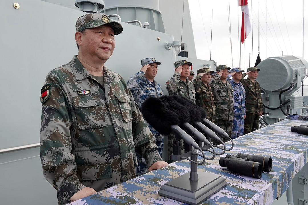 Chinese President Xi Jinping in the South China Sea. China has announced live-fire military exercises in the Taiwan Strait.