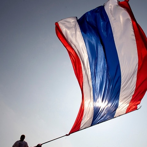 File image of the Thai national flag being hoisted
