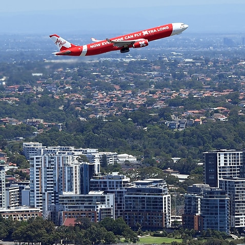 A plan taking off over Sydney Airport.