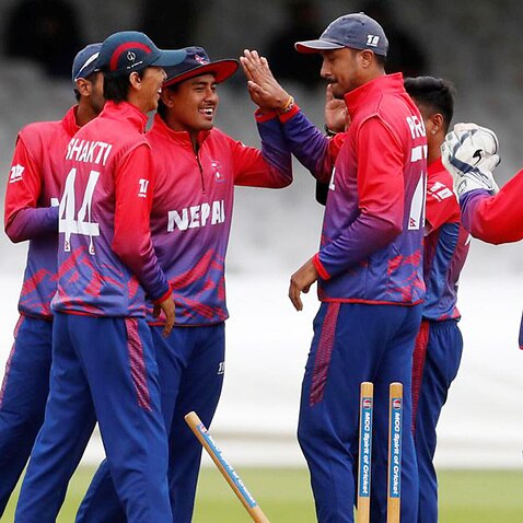 Nepali cricket team celebrating after its first ever one day international victory against Netherlands on Aug 2018.