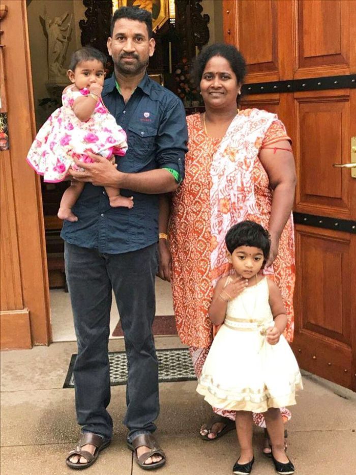 Nadesalingam and Priya with their two children. They are likely facing deportation. 