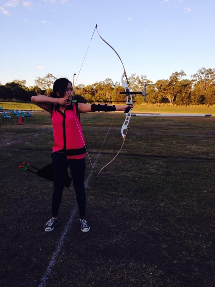 Sheila Hie aiming on outdoor target