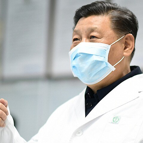 Xi warned officials that efforts to stop virus could hurt economy.