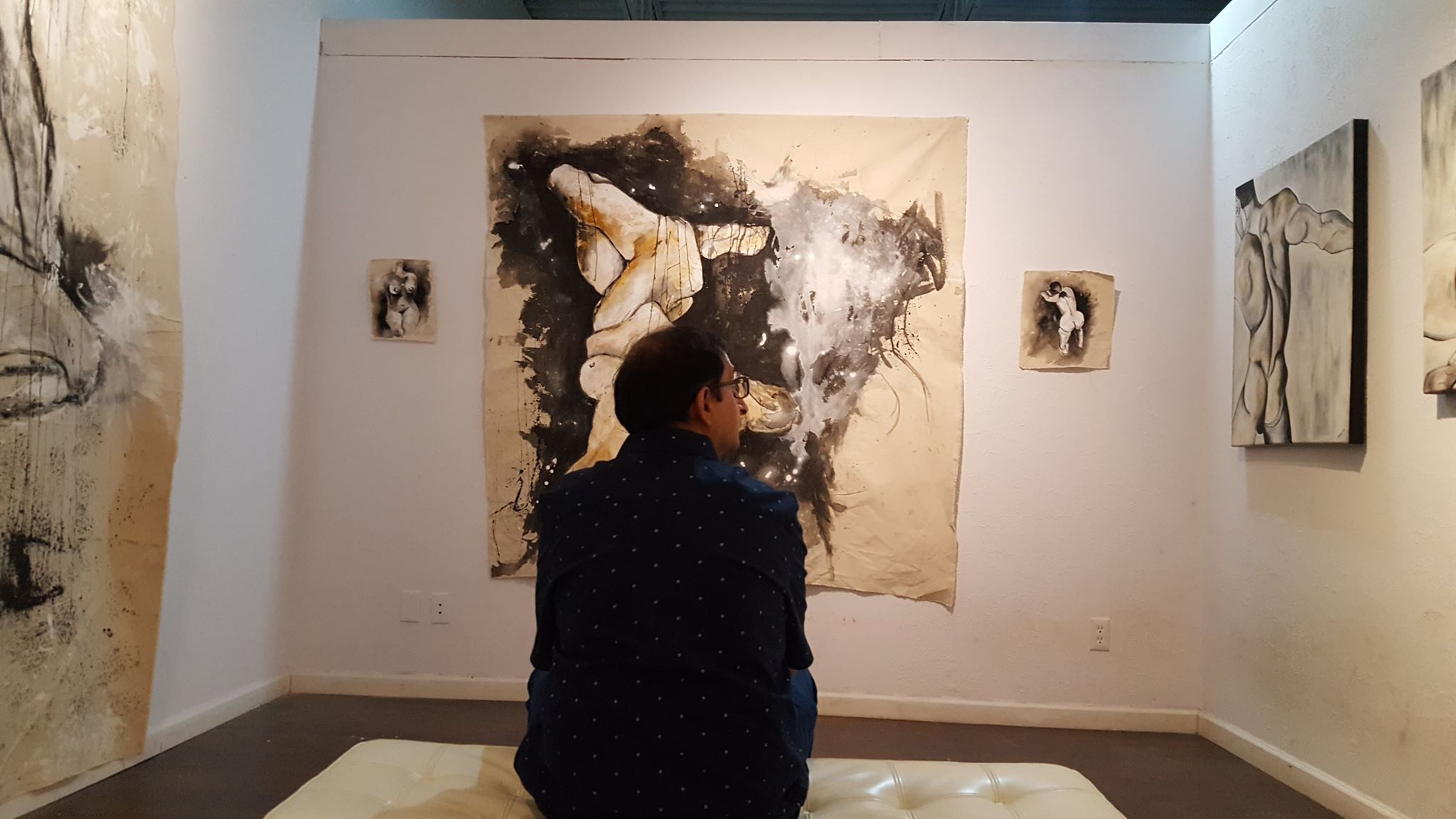 Nepali artist Kapil Mani Dixit with his artwork