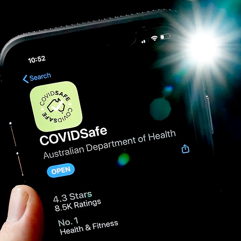 An iPhone displays the CovidSafe app released by the Australian government on Tuesday, April 29, 2019. 