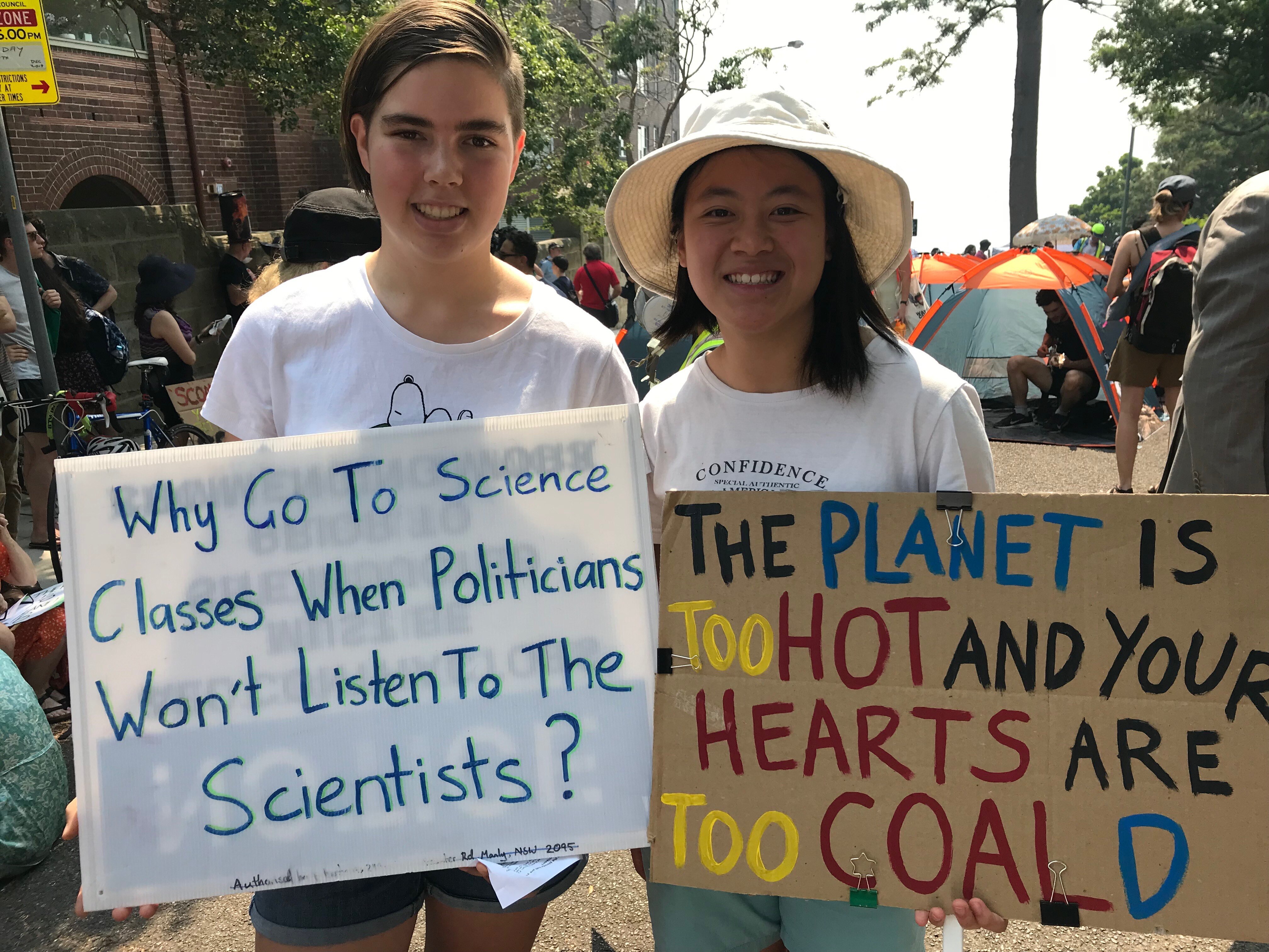Sonia Frieburg, 15, and Katherine Wen, 15, at the protest. 