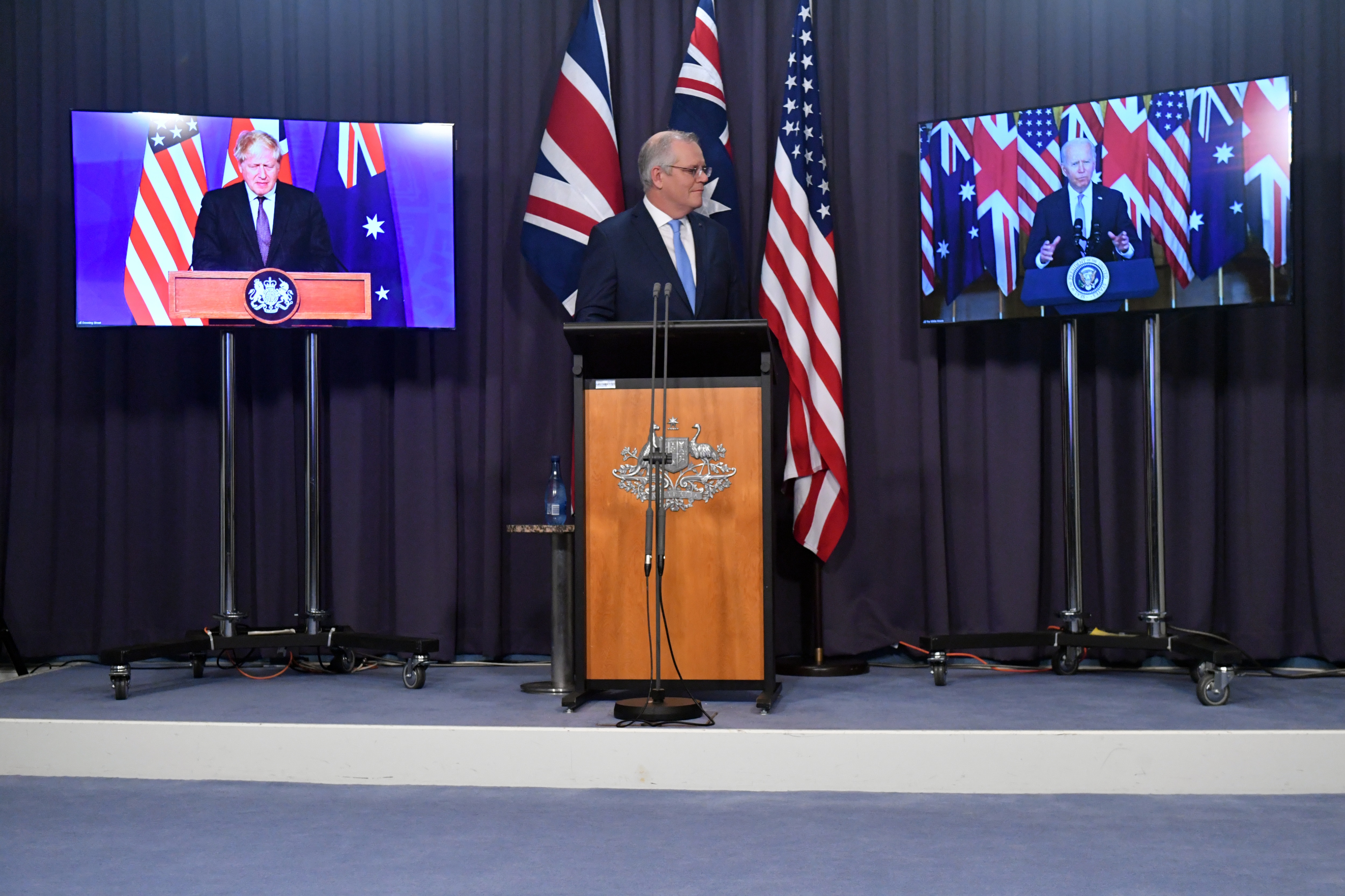 Boris Johnson, Scott Morrison and Joe Biden announcing the AUKUS alliance on Thursday morning.