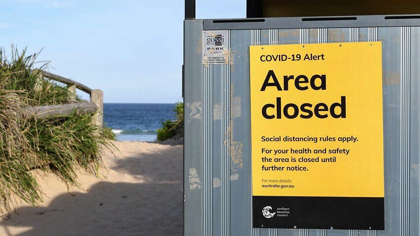 An area closed sign due to coronavirus at Freshwater Beach in Sydney.
