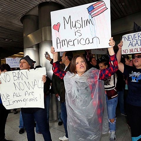 File photo: Protesters rally at Miami International Airport