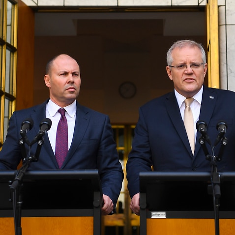 Australian Prime Minister Scott Morrison (right) and Australian Treasurer Josh Frydenberg speak to the media during a press conference at Parliament House in Canberra, Thursday, March 12, 2020. (AAP Image/Lukas Coch) NO ARCHIVING