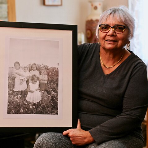 Dallas Phillips with one of her mother's iconic photographs 