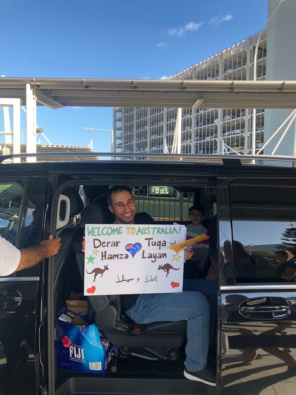 Derar leaving Sydney airport with his family.