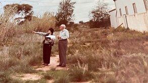 Yuriko Nagata, a researcher on the Japanese internment in Australia, visiting a former camp site in 1984 with a former guard the late Mr Burt Whitmore.