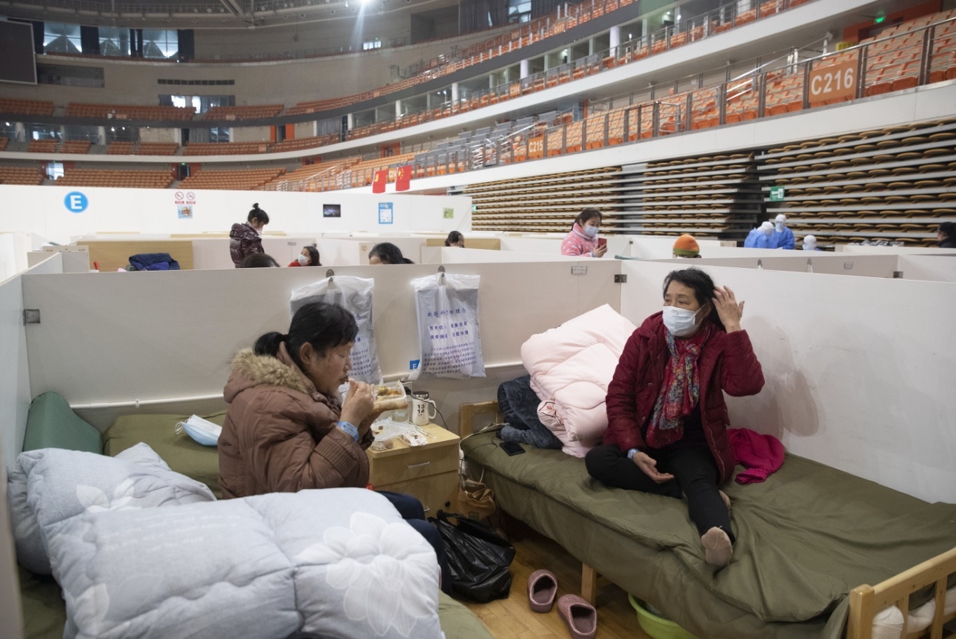Patients are seen in Wuhan Fangcang hospital, a makeshift hospital to treat Covid-19 patients in Wuhan City Patients are seen in Wuhan Fangcang hospital, a makeshift hospital to treat Covid-19 patients in Wuhan City