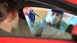 South Australia Hospital staff simulate a drive through coronavirus testing at the Repatriation Hospital in Adelaide, Tuesday, 10 March, 2020.