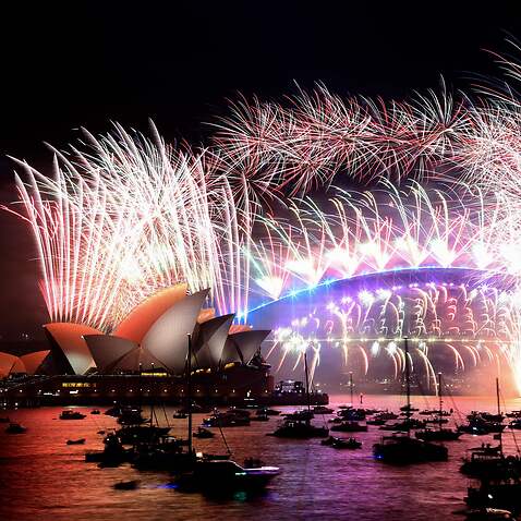 New Year's Eve fireworks light up the sky over Sydney's iconic Harbour Bridge and Opera Houseduring the fireworks show on 1 January, 2022. 