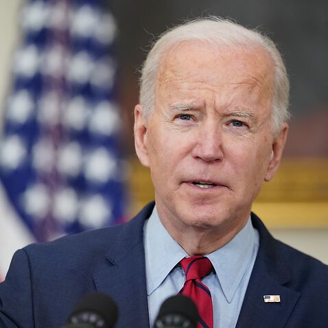 US President Joe Biden speaks about the Colorado shootings in the State Dining Room of the White House in Washington, DC, on 23 March 2021.