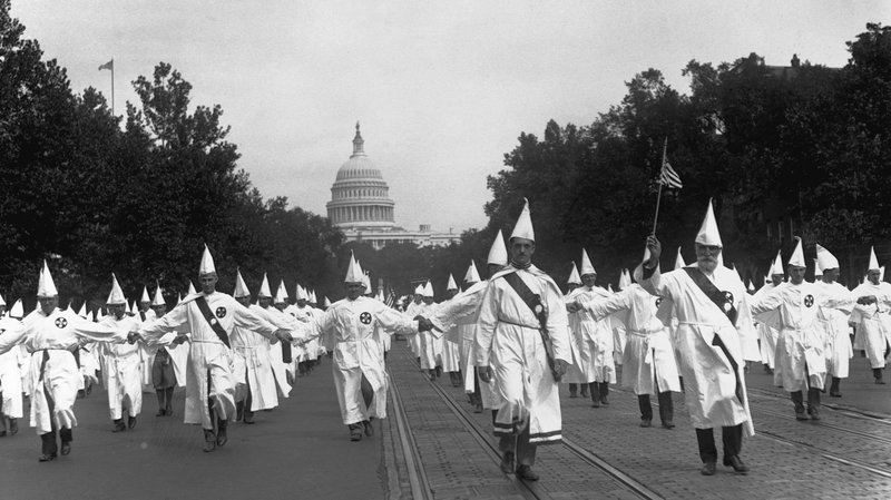 Ku Klux Klan members hold a march in Washington, D.C., 1925. Ku Klux Klan members hold a march in Washington, D.C., 1925.