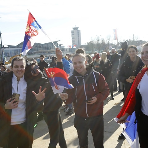 Supporters of Serbian tennis player Novak Djokovic gather at the Nikola Tesla Airport in Belgrade, Serbia, 17 January 2022. 