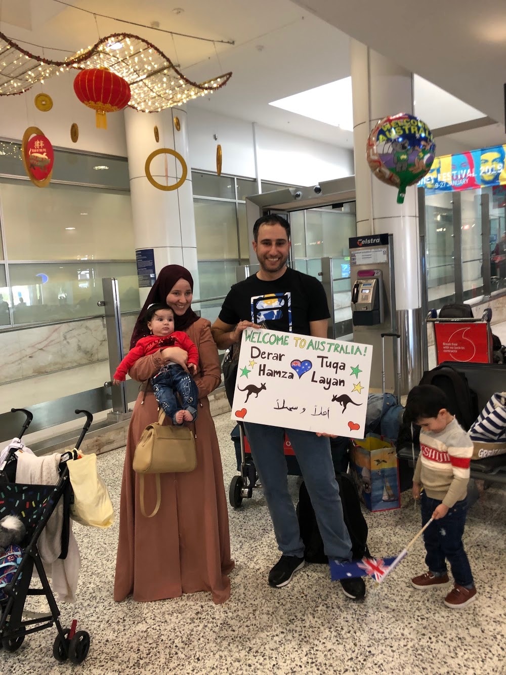 Derar and his family arrive at Sydney airport.