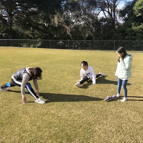Mr Wu's families exercising in Melbourne