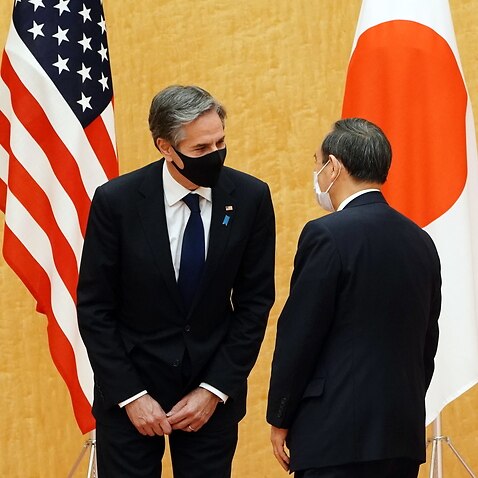 Japanese Prime Minister Yoshihide Suga talks with US Secretary of State Antony Blinken in Tokyo, Japan, 16 March 2021. 