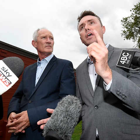 One Nation party officials Steve Dickson (left) and James Ashby field questions during a press conference in Brisbane.