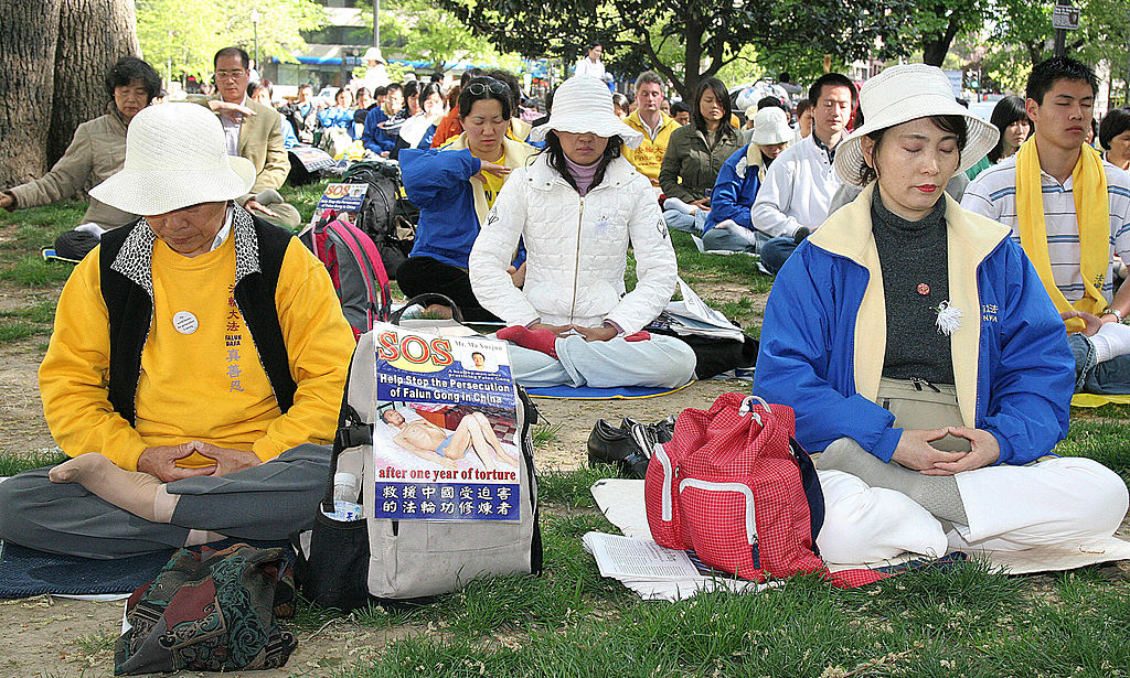 Falun Gong practitioners meditate in Washington.