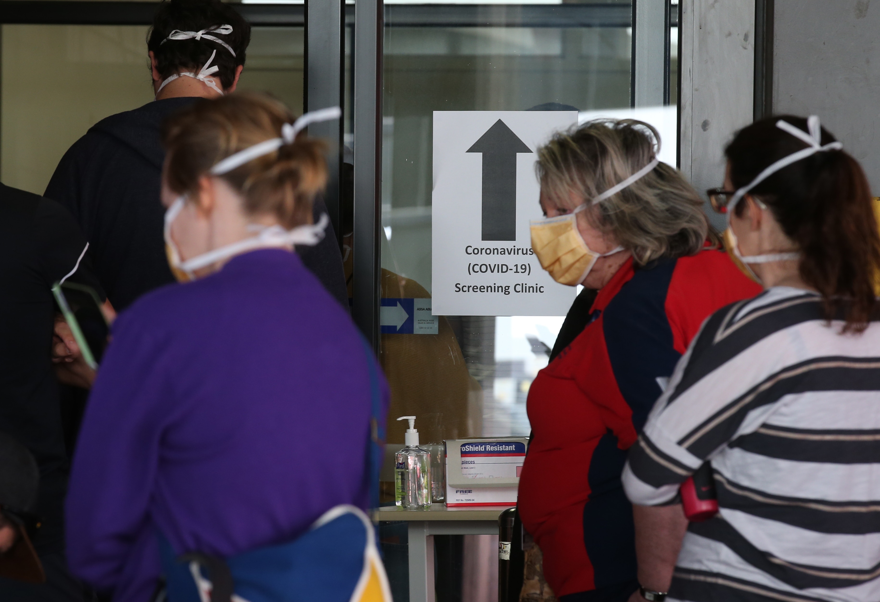 Patients line up at the Royal Melbourne Hospital for Coronavirus testing. Tuesday, 10 March, 2020.