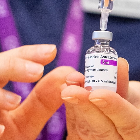  A nurse prepares a dose of the Oxford/AstraZeneca Covid-19 vaccine.