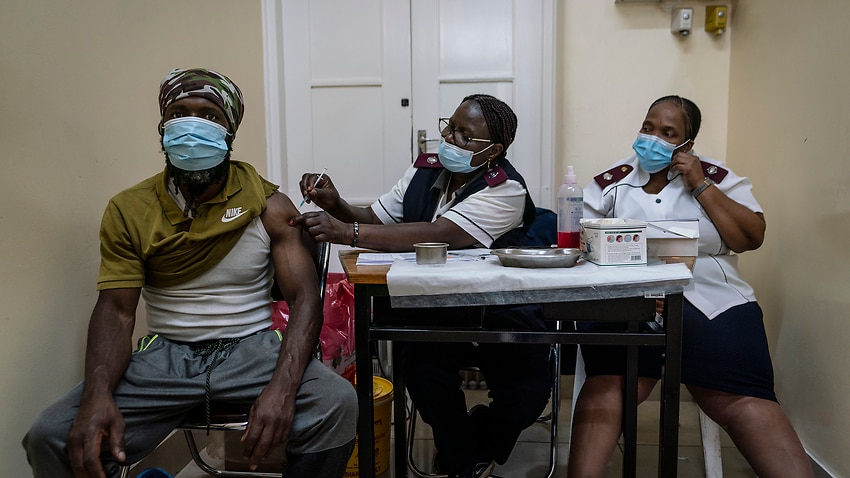 A man is vaccinated against COVID-19 at the Hillbrow Clinic in Johannesburg, South Africa, Monday 6 December, 2021.