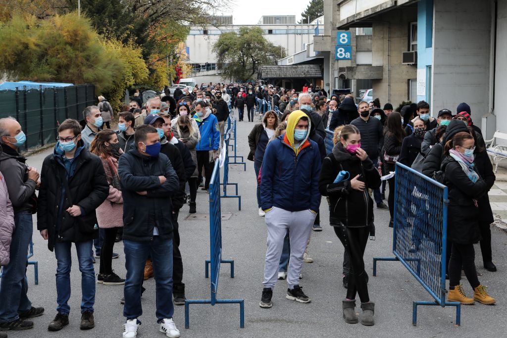 People wait in lines to get vaccinated against COVID-19 in Zagreb, Croatia, Nov. 6, 2021.