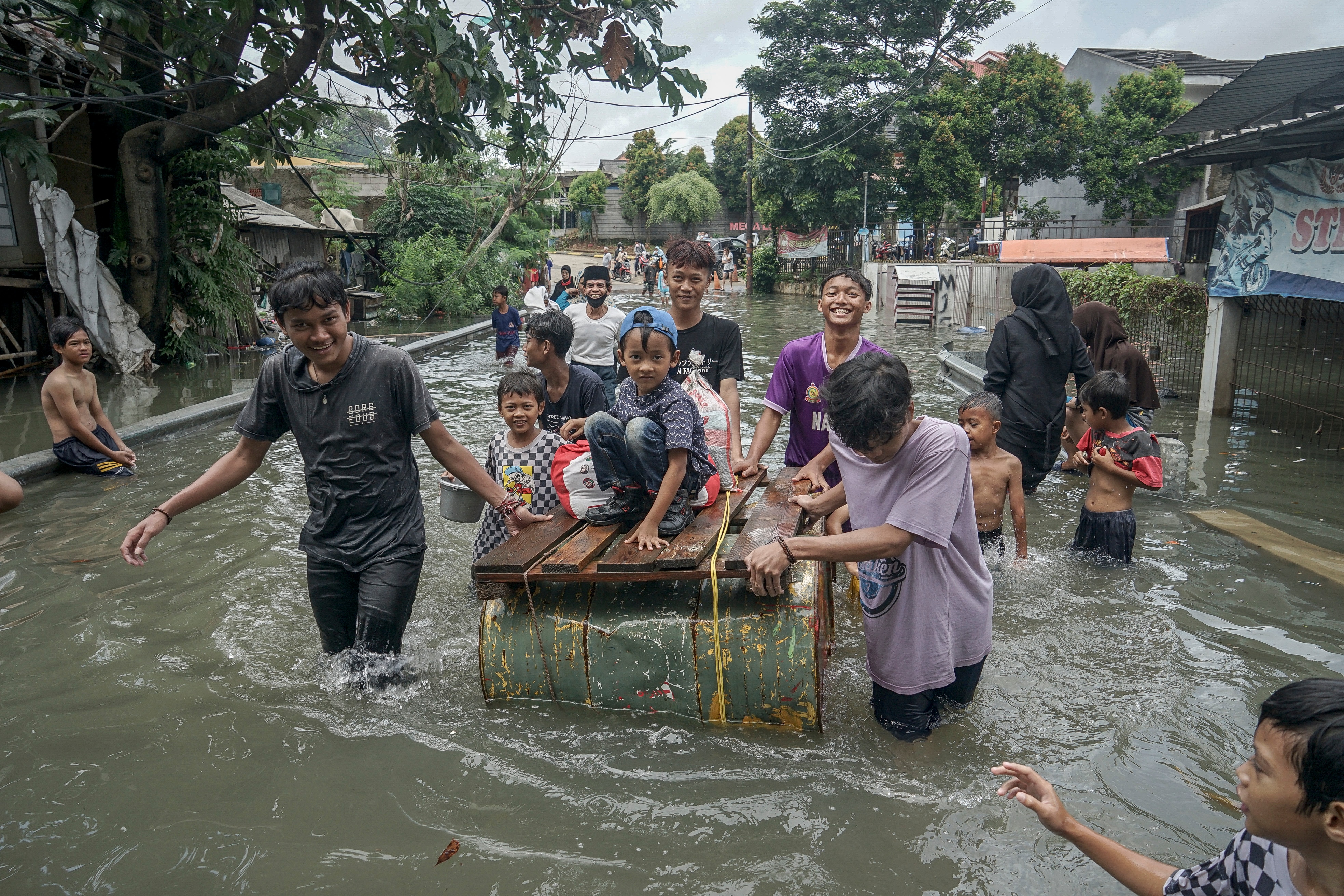 Seasonal rains and high tides in recent days have caused dozens of landslides and widespread flooding.