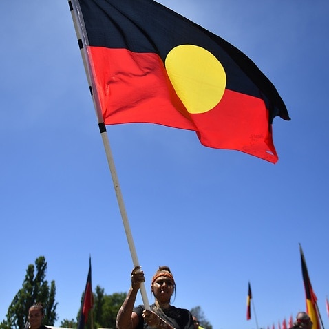 Protestors at an Invasion Day rally at the Aboriginal Tent Embassy, outside Old Parliament House in Canberra, Thursday, Jan. 26, 2017. (AAP Image/Mick Tsikas) NO ARCHIVING