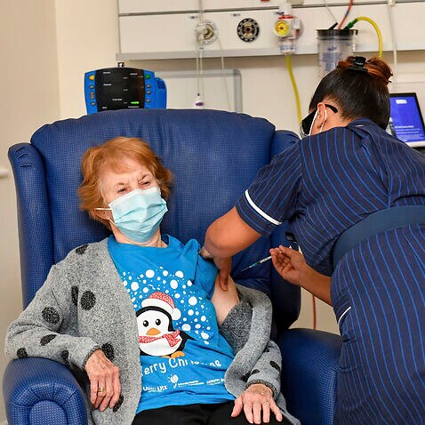 Margaret Keenan, 90, received the Pfizer-BioNTech COVID-19 vaccine at University Hospital in Coventry, England, on 8 December.