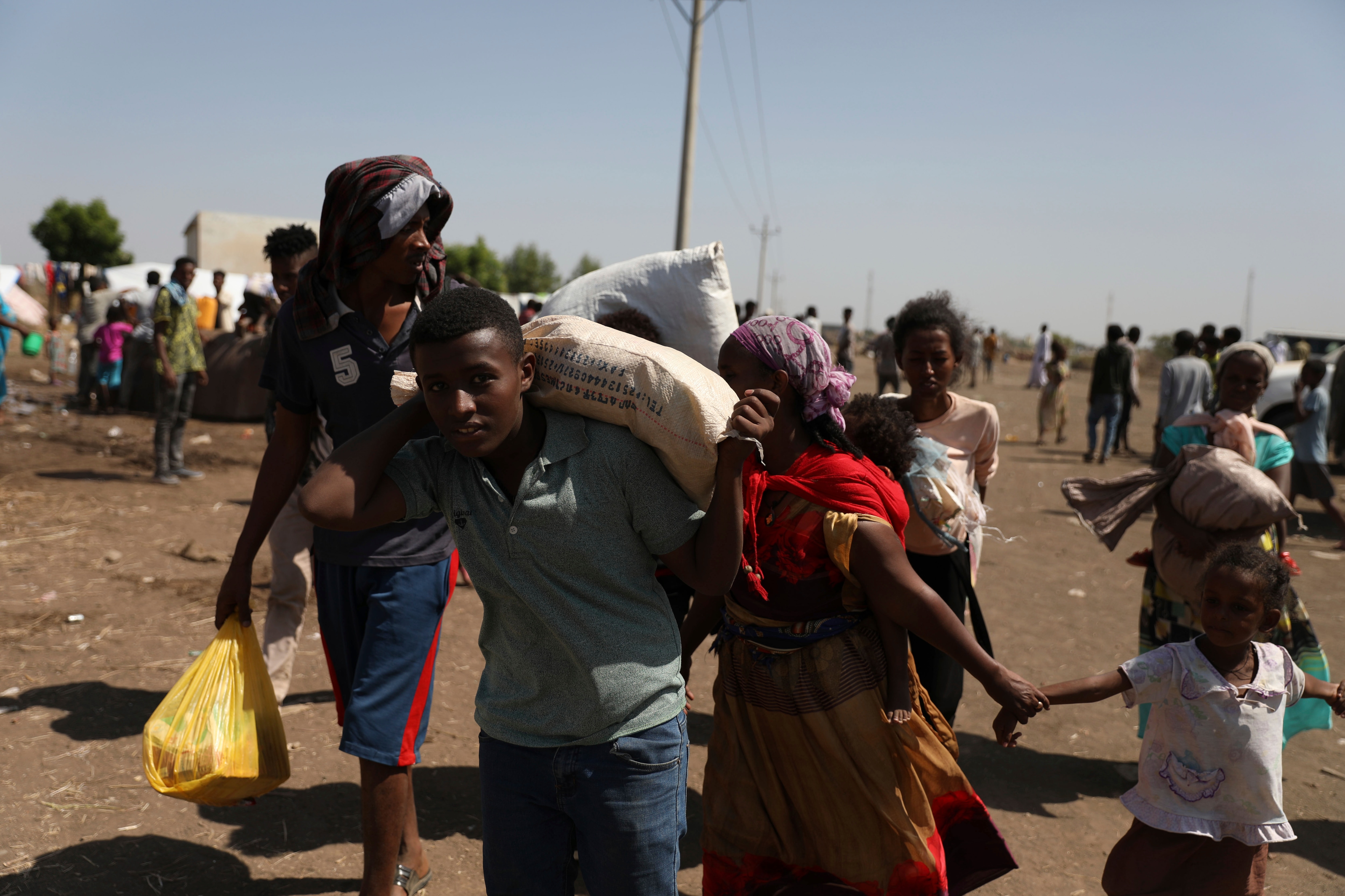 Refugees from the Tigray region of Ethiopia arrive at Hamdayet, Sudan.